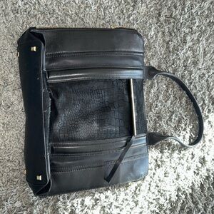 Chic Black Leather Handbag with Gold Accents